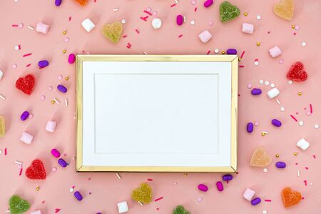Top view decoration assorted gummy candies and jelly sweets happy holiday background concept. Flat...