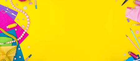 DIY. Banner. Craft supplies and tool on yellow background. Womens hobby - sewing, embroidery, felt...