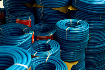 Garden equipment for watering plants, hoses. Sale in the garden center. Russia, Rostov-on-Don 06.06.2020のeditorial素材