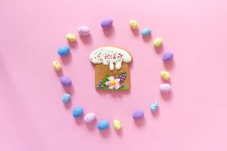 Easter poster and banner template with Easter cakes and colored eggs on pink background.Greetings...