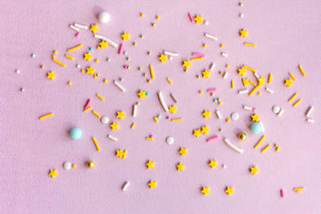 Sugar sprinkles grainy background for holiday designs, party, birthday, wedding invitationの写真素材