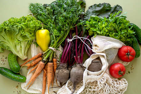 Eco farm products organic vegetables in mesh bagsの写真素材