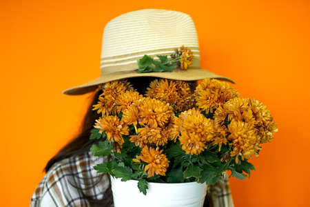 Portrait without face Girl covers her face flowersの写真素材