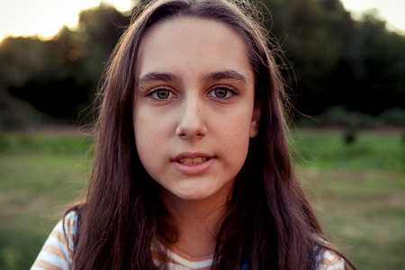 Portrait teenage girl having fun at natureの写真素材