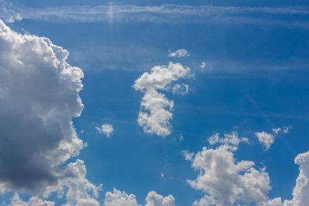 Blue sky with white clouds backgroundの写真素材