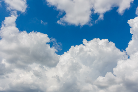 Blue sky with white clouds backgroundの写真素材