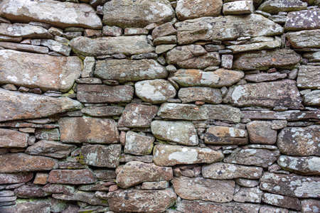 Part of a old stone wall, for background or texture.の写真素材