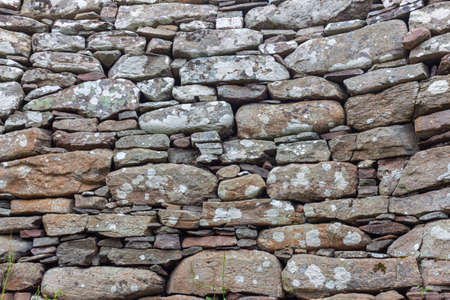 Part of a old stone wall, for background or texture.の写真素材