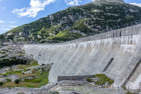 Gelmer dam near by the Grimselpass in Swiss Alps, Switzerlandの写真素材