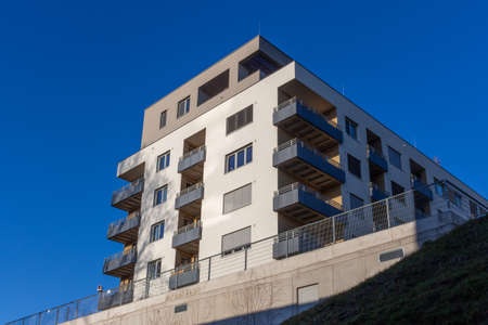modern architecture residential building condominium appartments blue skyの写真素材