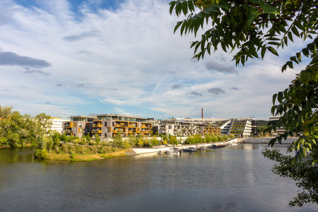 modern architecture residential building condominium appartments development cloud with small boat marinaの写真素材