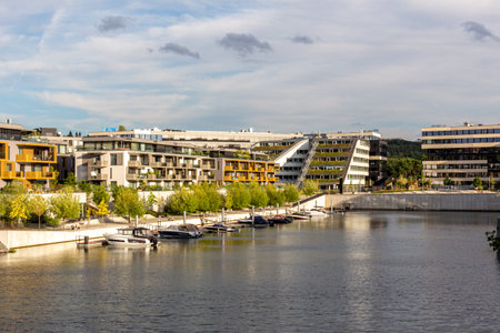 modern architecture residential building condominium appartments development cloud with small boat marinaの写真素材