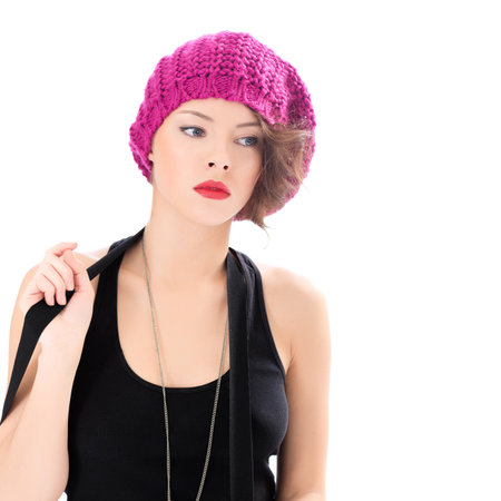 Close portrait of pretty cheerful woman wearing pink hatの写真素材
