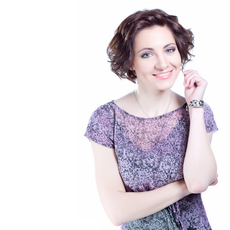 Beautiful young smiling woman on white  backgroundの写真素材