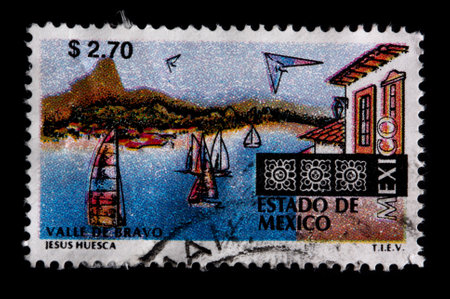 MEXICO - CIRCA 1997: A $2.70 stamp printed in Mexico shows sailboats and buildings at the resort town of Valle de Bravo in the Estado de Mexico,circa 1997のeditorial素材