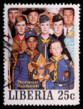 LIBERIA - CIRCA 1979: A 25-cent stamp printed in Liberia shows a Norman Rockwell painting of diverse people representing the Boy Scouts of America, circa 1979のeditorial素材