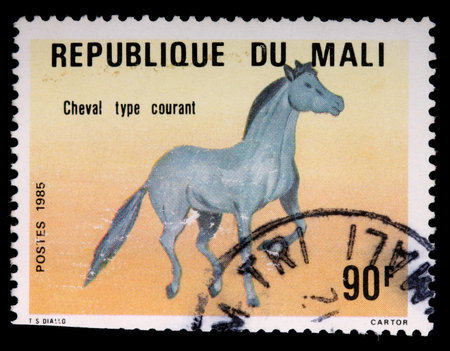 REPUBLIC OF MALI - CIRCA 1985: A 90-franc stamp printed in the Republic of Mali shows a running horse, circa 1985のeditorial素材