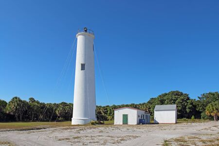 Lighthouse and associated buildings at the north end of Egmont Key, a small island near the mouth of Tampa Bay, Floridaの写真素材