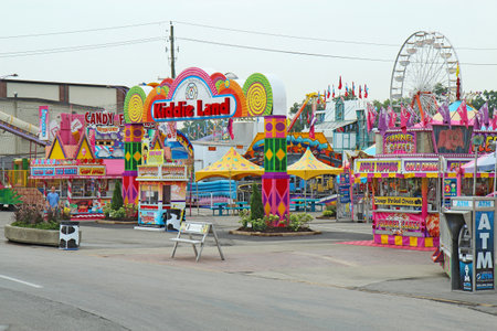 INDIANAPOLIS, INDIANA Ð AUGUST 19: Entrance to Kiddie Land and rides on the Midway of the Indiana State Fair on August 19, 2011. This very popular fair hosts more than 850,000 people every August.のeditorial素材