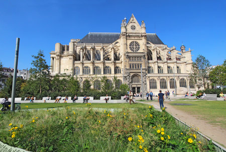 PARIS, FRANCE - SEPTEMBER 10 2014: Saint Eustache church viewed from the Nelson Mandela gardens. This church, built between 1532 and 1632, is a popular gathering spot for Parisians and tourists.のeditorial素材