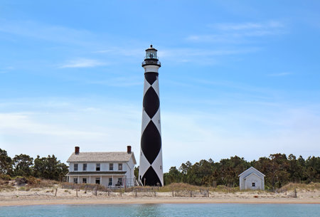 Cape Lookout Lighthouse on the Southern Outer Banks or Crystal Coast of North Carolina viewed from the waterのeditorial素材