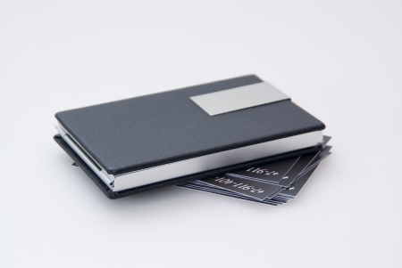 Black card holder and business cardsの写真素材