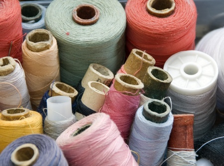 Many different reels of thread for sew 