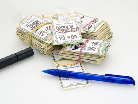 A heap of price-tags, pen and markerの写真素材