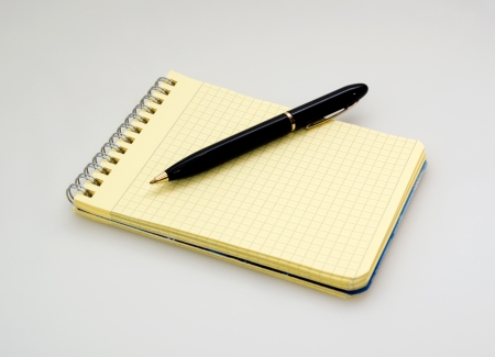 Notebook and black penの写真素材