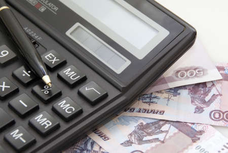 Calculator, money and black penの写真素材