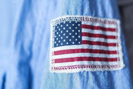 Stripe of USA flag on shirt sleeveの写真素材