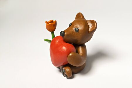 Plasticine bear with flower and eightの写真素材