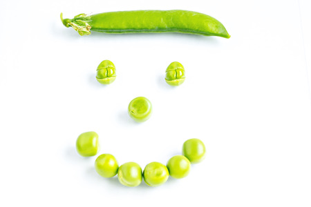 Smiling peas faceの写真素材