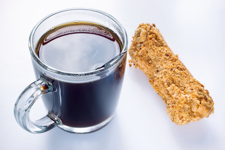 Morning coffee with eclairsの写真素材