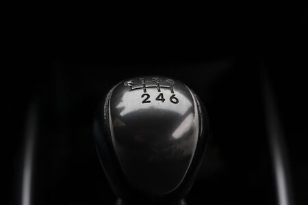 Handle of a six-speed manual gearstick of gearbox in carの写真素材