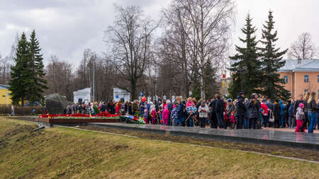 Many citizens queuing up at the war memorial in city to lay flowers