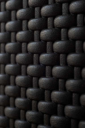 Dark wicker textured background pattern