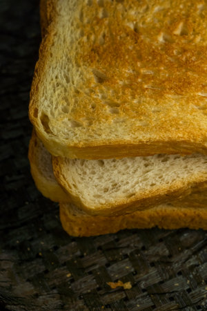 Ruddy toasts for breakfast are on table, verticalの写真素材
