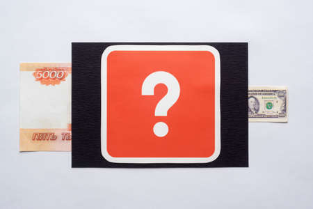 Money transfer into dollars and question mark flat backgroundの写真素材