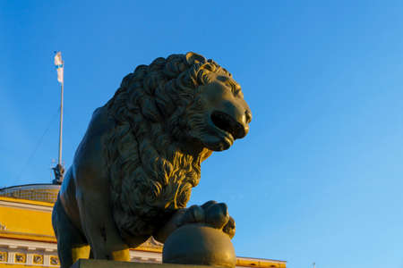 A wonderful sculpture of lion predator in St. Petersburg in rays of sunset lightのeditorial素材