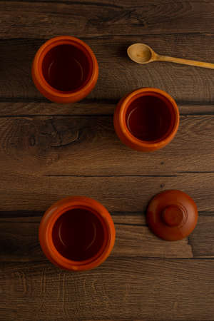 Best safe crockery are clay pots on wooden tableの写真素材