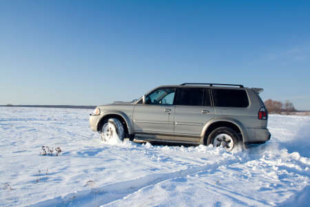 Car drifting on a snow field. Winter travel.