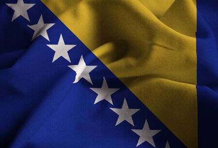 Closeup of Ruffled Bosnia and Herzegovina Flag, Bosnia and Herzegovina Flag Blowing in Windの写真素材