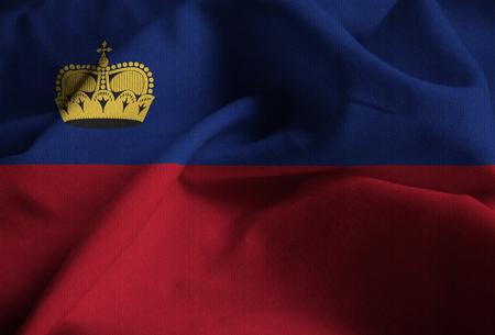 Closeup of Ruffled Liechtenstein Flag, Liechtenstein Flag Blowing in Windの写真素材