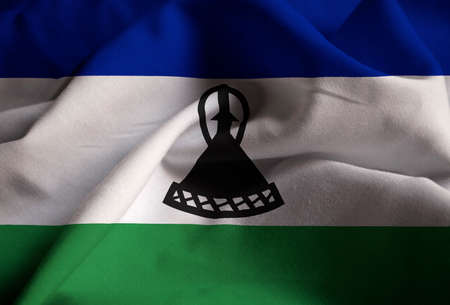 Closeup of Ruffled Lesotho Flag, Lesotho Flag Blowing in Windの写真素材
