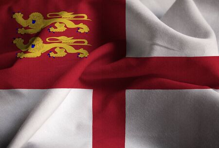 Closeup of Ruffled Sark Flag, Sark Flag Blowing in Windの写真素材