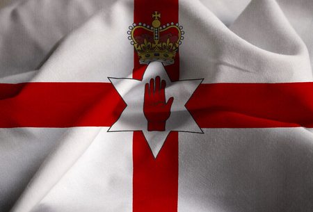 Closeup of Ruffled Northern Ireland Flag, Northern Ireland Flag Blowing in Windの写真素材