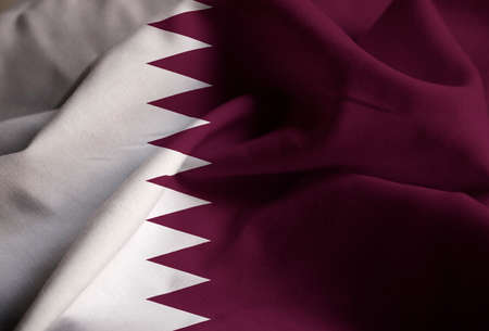 Closeup of Ruffled Qatar Flag, Qatar Flag Blowing in Windの写真素材