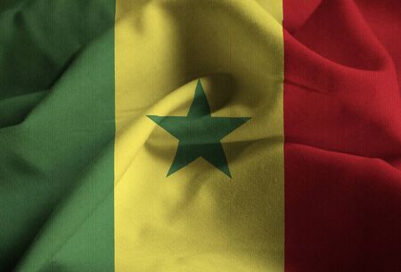 Closeup of Ruffled Senegal Flag, Senegal Flag Blowing in Windの写真素材