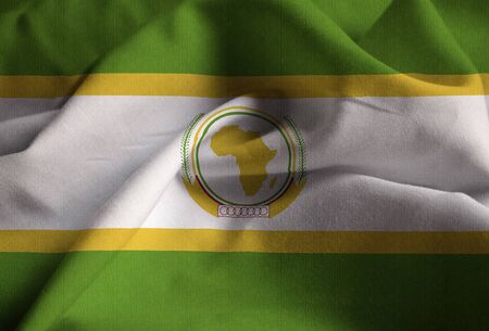 Closeup of Ruffled The African Union Flag, The African Union Flag Blowing in Windの写真素材